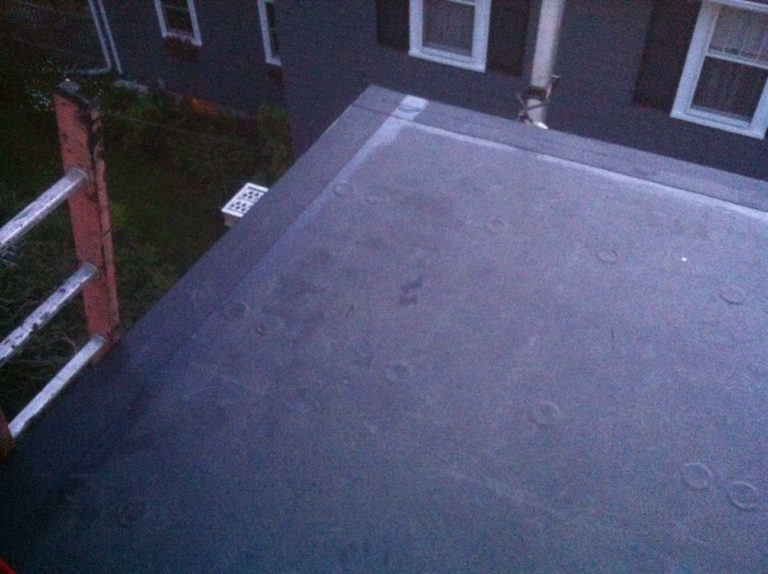 Flat roof leak repair in Cambridge